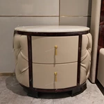 Round Cream Tufted Leather Nightstand with White Marble Top and Dark Glossy Frame